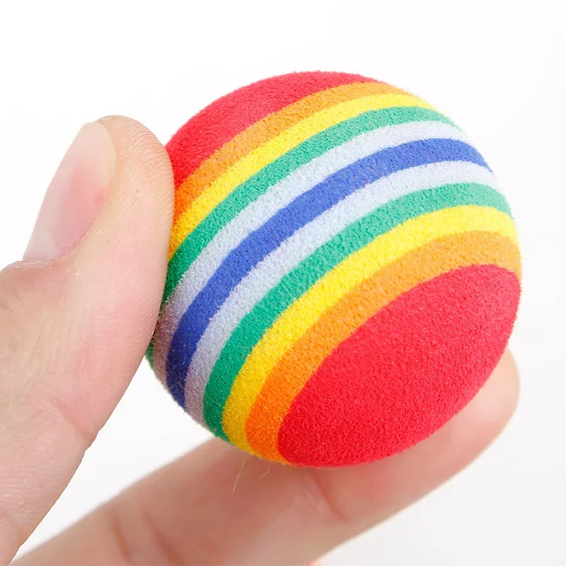 Rainbow EVA Cat Toys Ball Interactive Cat Dog Play Chewing Rattle Scratch EVA Ball Training Balls Pet Toys Supplies by HARMONYA STORE